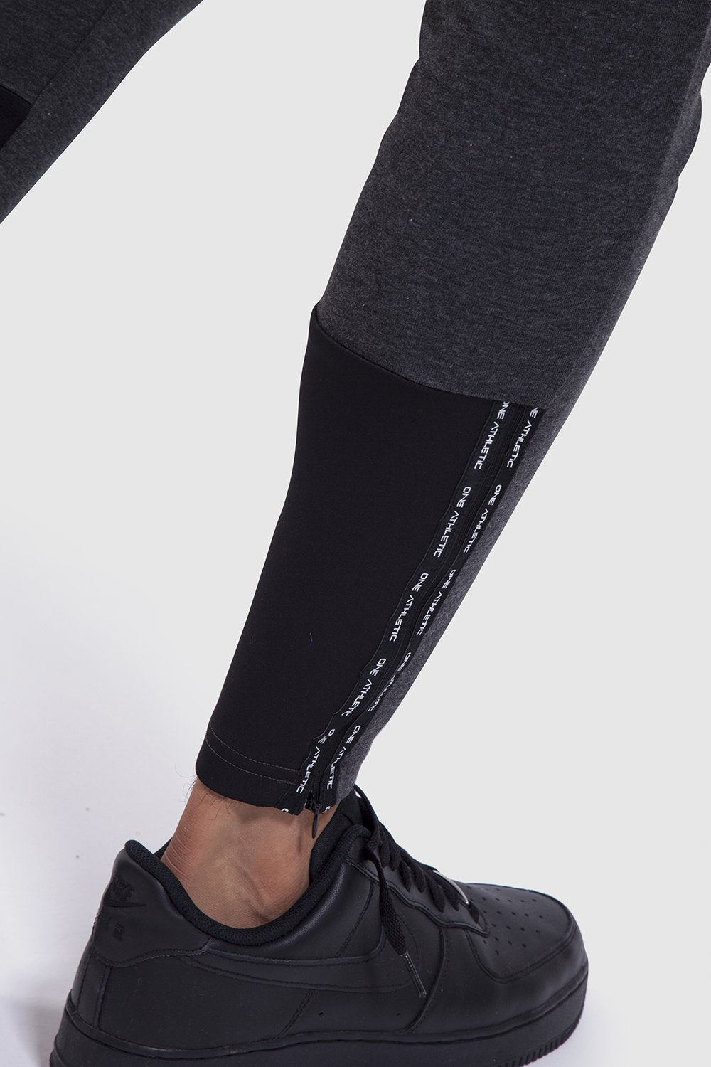 Lower leg detail of charcoal gym joggers for men