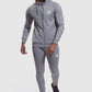 zipped up track top and gym joggers