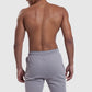 Back profile of grey gym shorts