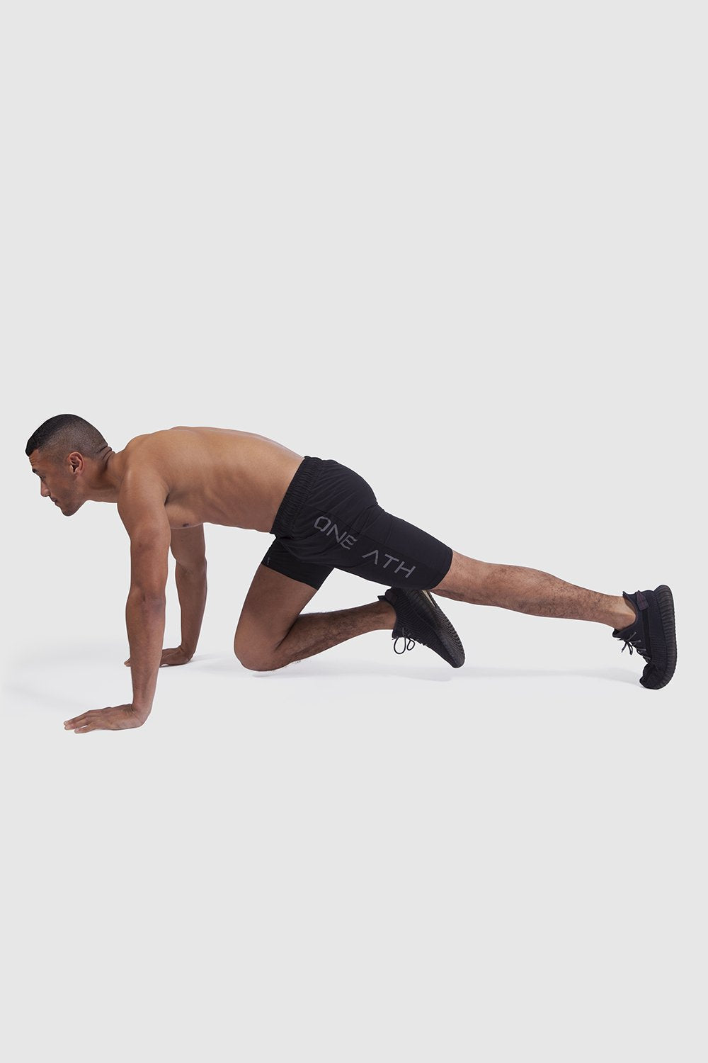 Athlete training in black MTech shorts