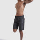 athlete stretching in mens training shorts